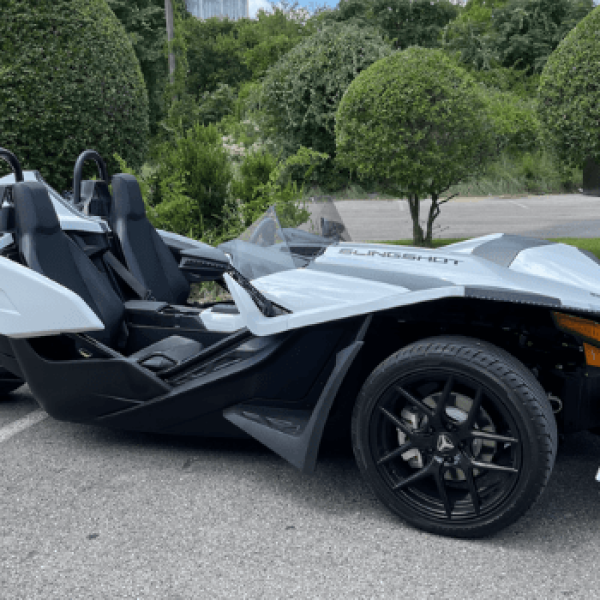 a motorcycle parked on the side of a road