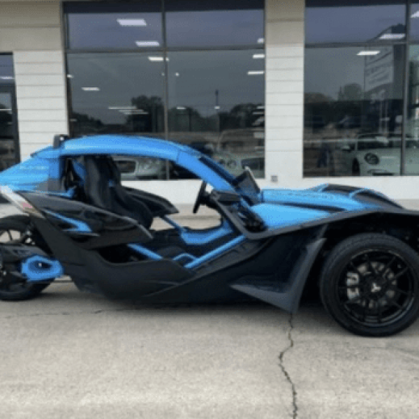 a car parked on the side of a building