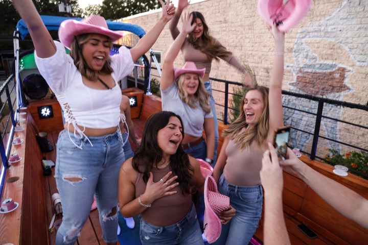 a group of people posing for the camera