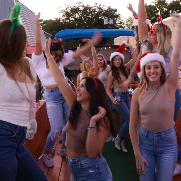 a group of people standing in front of a crowd