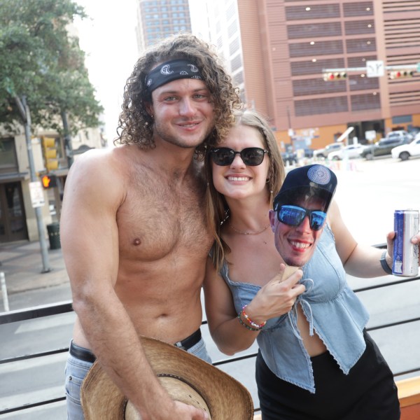 a person wearing sunglasses posing for the camera