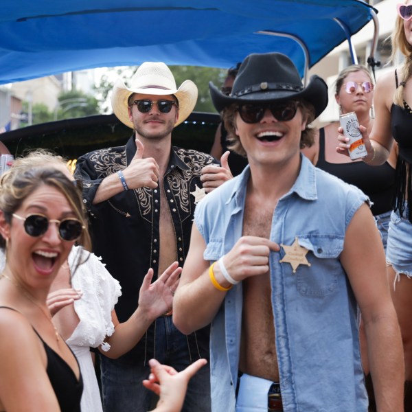 a group of people posing for the camera