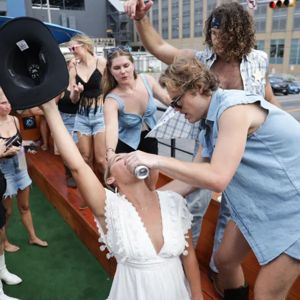 a person standing in front of a crowd of people