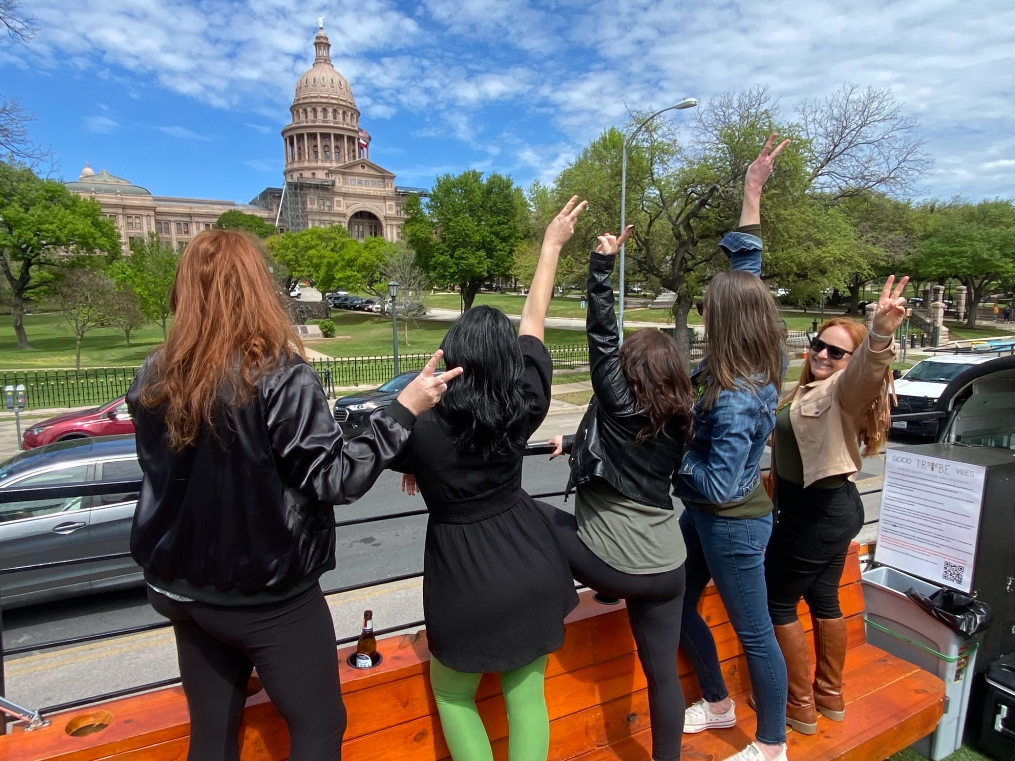 a group of people standing in front of a building