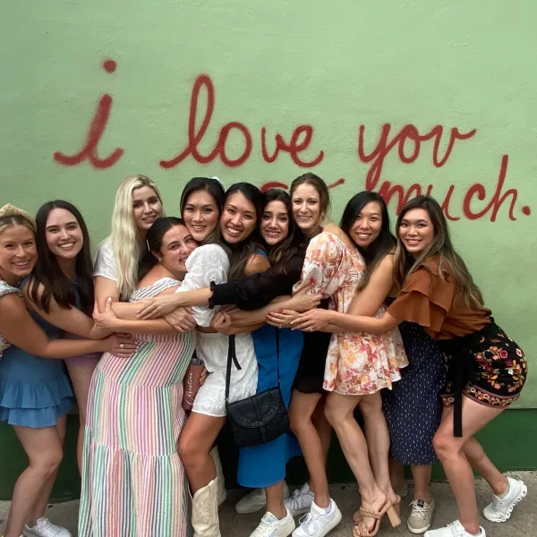 a group of people posing for a photo