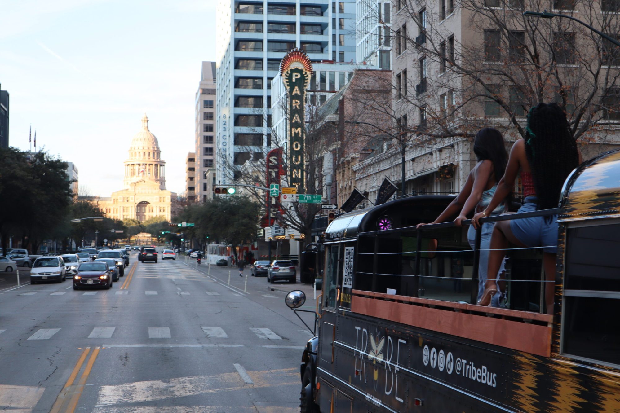 a person riding a skateboard on a city street