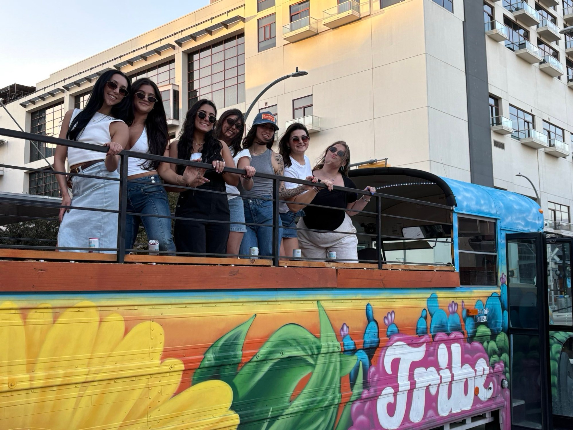 a group of people standing in front of a building